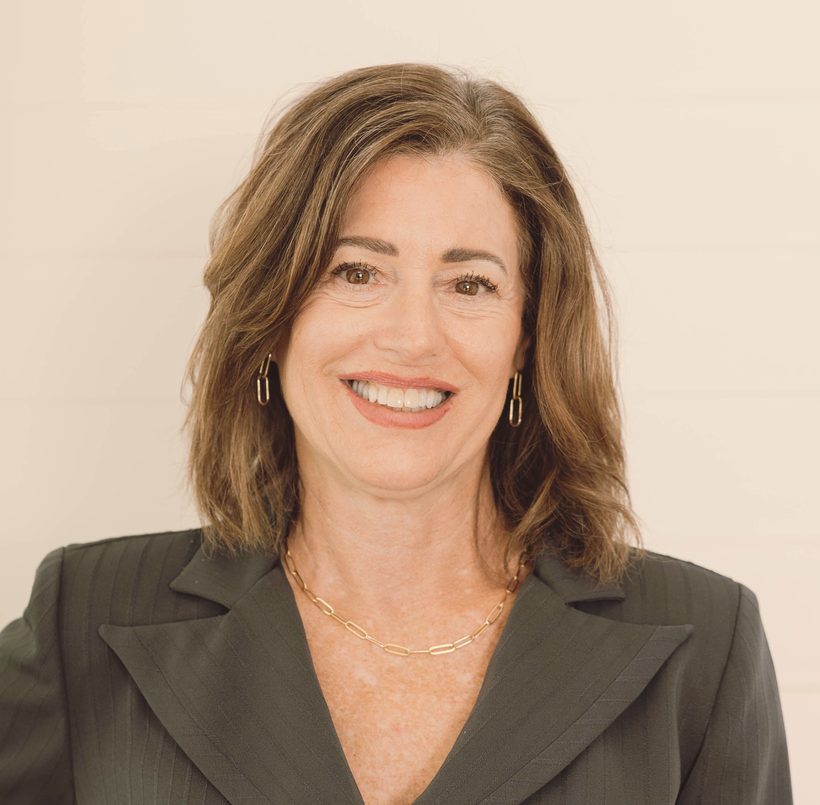 Mary Hall, Licensed Owner/Agent, smiling warmly