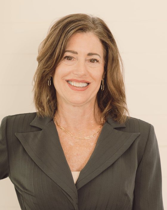 Mary Hall, a licensed local insurance agent, smiling warmly